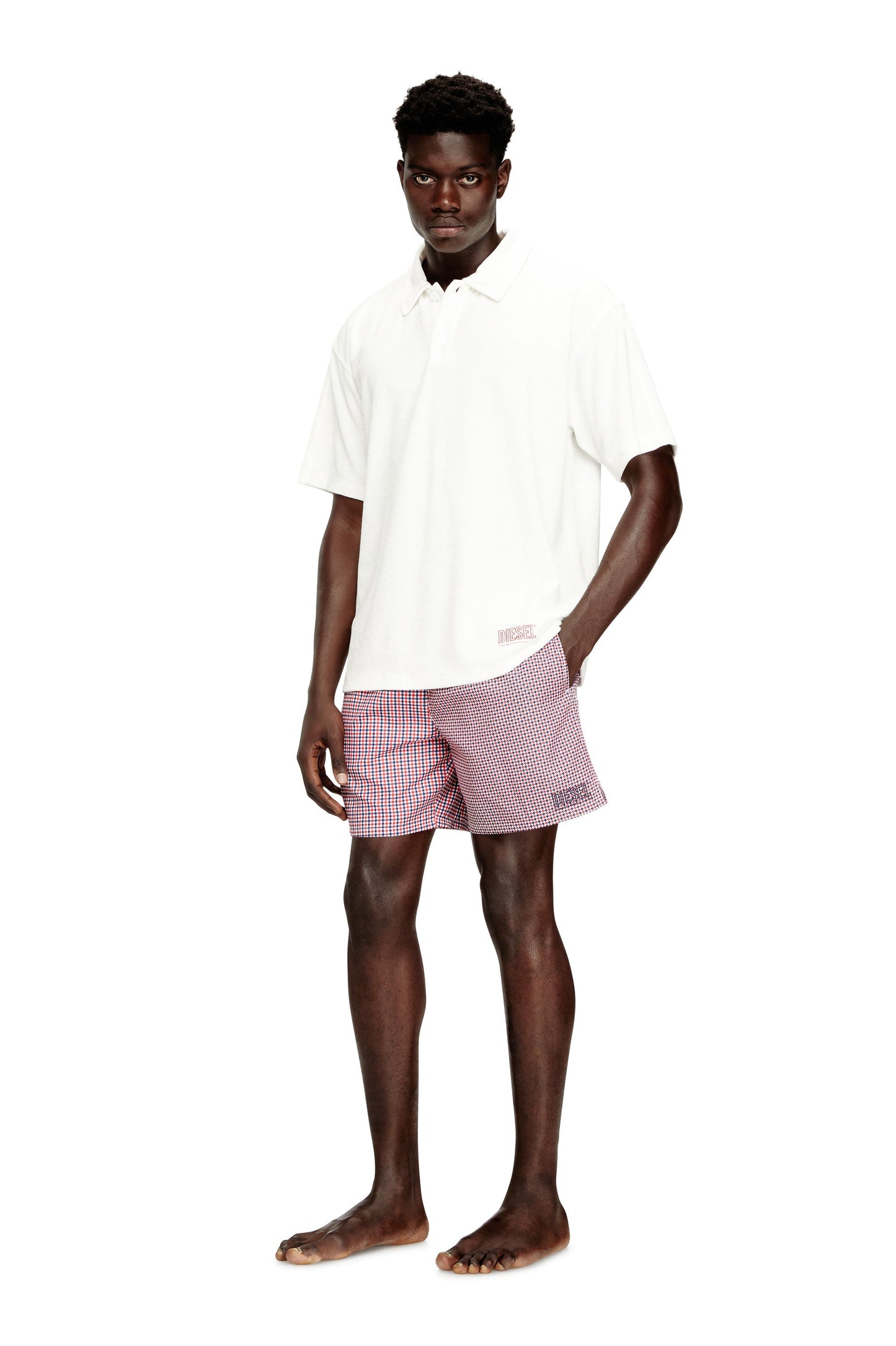 Swim shorts with mixed patterns
