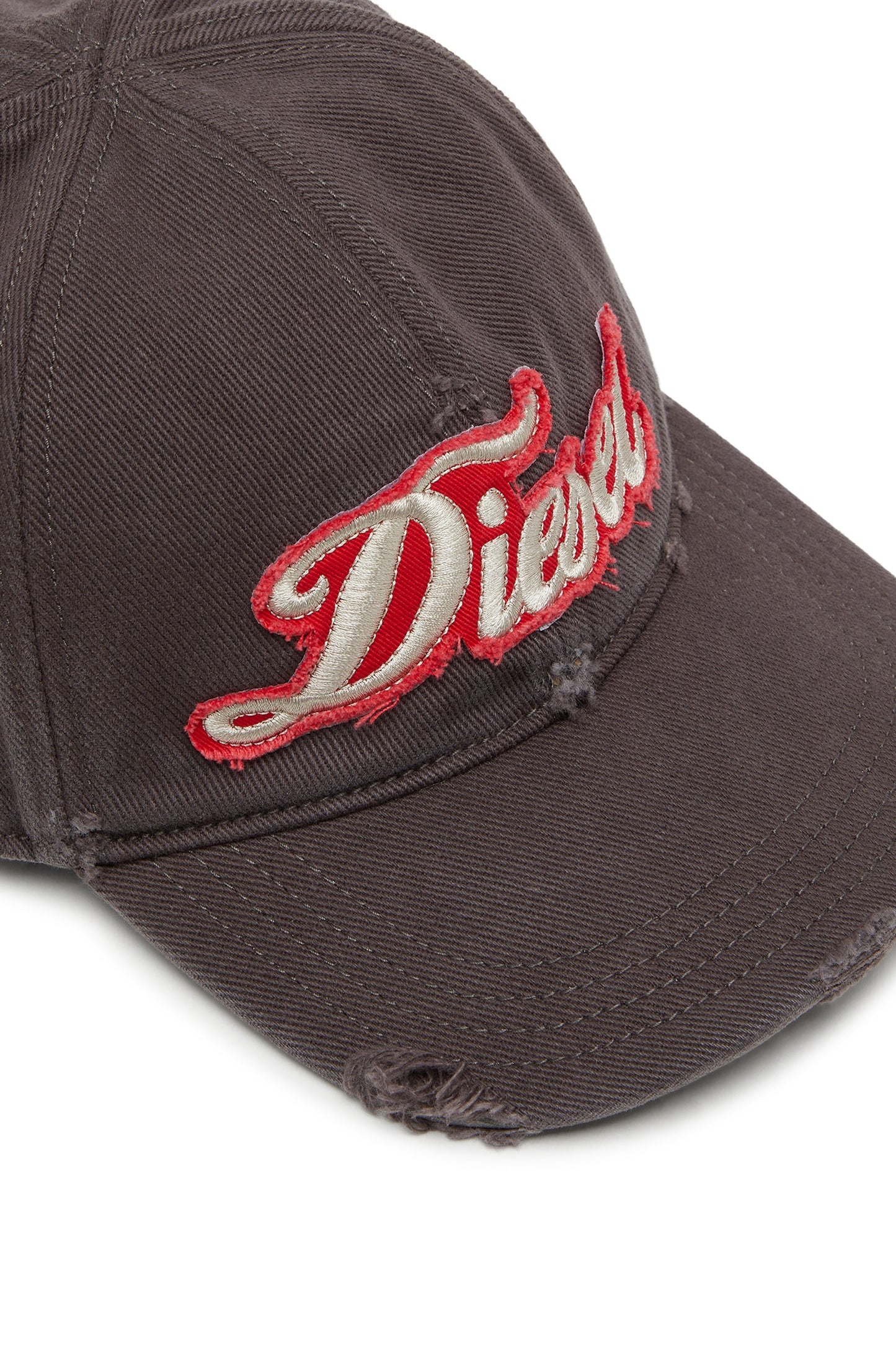 Distressed baseball cap with embroidered patch